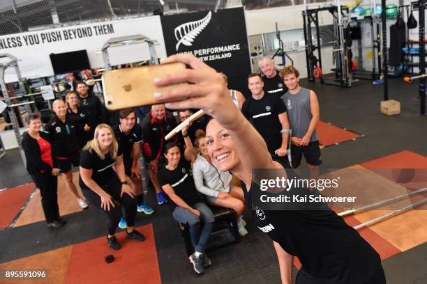 New Zealand para swimmer Sophie Pascoe takes a selfie with the Commonwealth Games Queen's baton and fellow athletes during a Commonwealth Games...