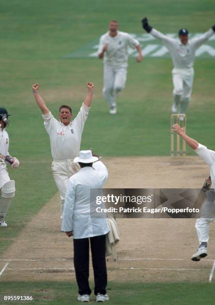 England bowler Darren Gough celebrates the final South African wicket of Makhaya Ntini on the final day of the 5th Test match between England and...