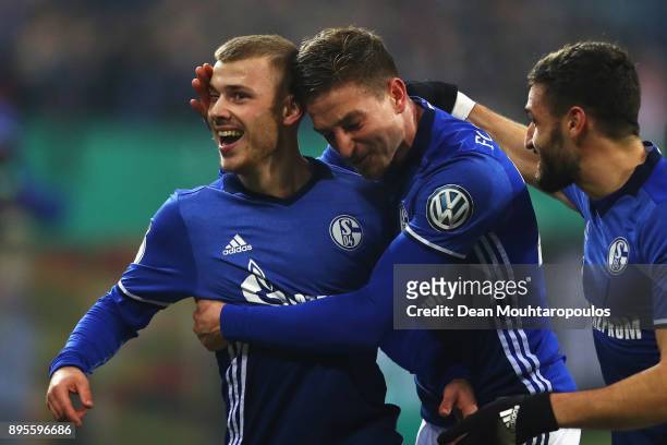 Max Meyer of Schalke 04 celebrates scoring his teams first goal of the game with team mates during the DFB Pokal match between FC Schalke 04 and 1....