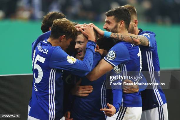 Max Meyer of Schalke 04 celebrates scoring his teams first goal of the game with team mates during the DFB Pokal match between FC Schalke 04 and 1....