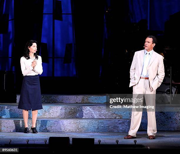 Actors Jessica Biel as Sarah Brown and Brian Stokes Mitchell as Sky Masterson perform in Guys & Dolls at The Hollywood Bowl on July 31, 2009 in...