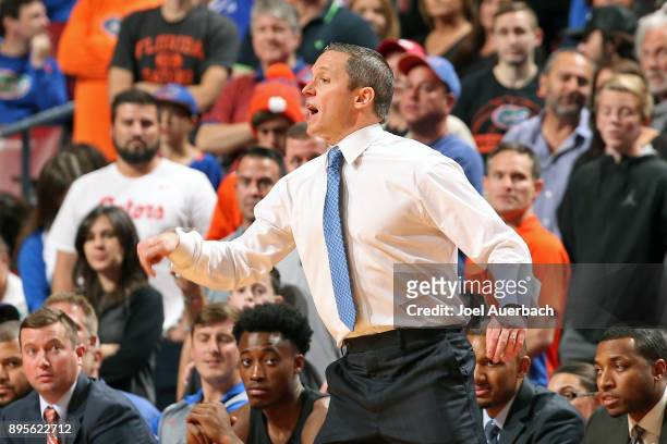 Head coach Michael White of the Florida Gators reacts to second half action against the Clemson Tigers during the MetroPCS Orange Bowl Basketball...