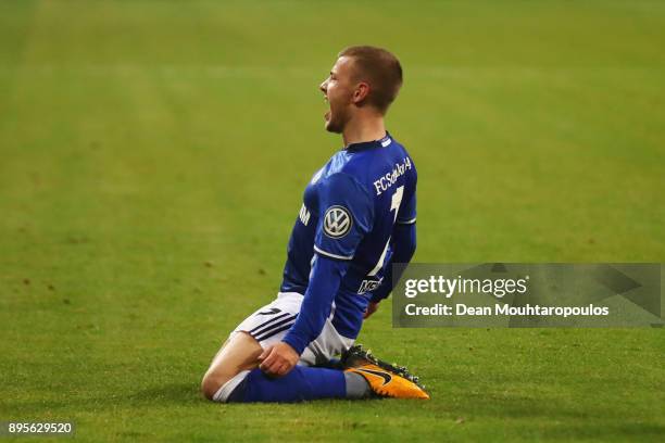 Max Meyer of Schalke 04 celebrates scoring his teams first goal of the game during the DFB Pokal match between FC Schalke 04 and 1. FC Koeln at...