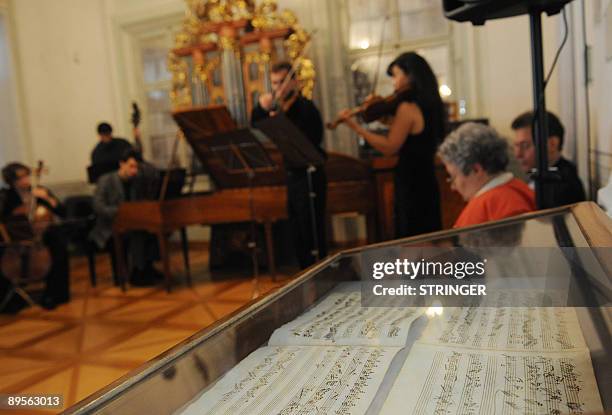 Two piano pieces almost certainly composed by Wolfgang Amadeus Mozart are presented on August 2, 2009 as musicians perform during a press conference...