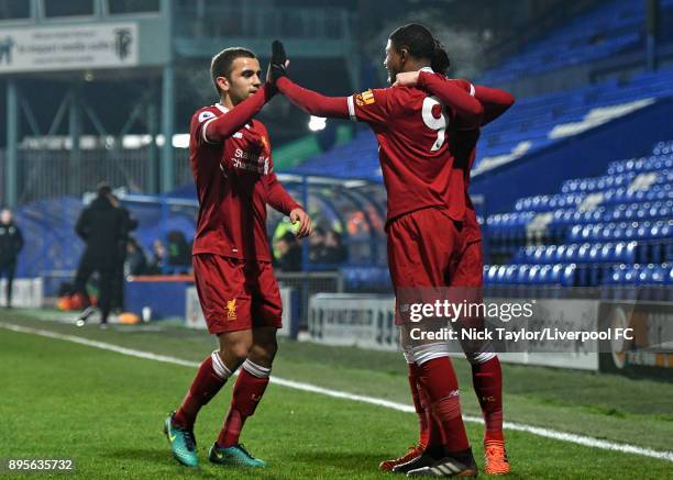 Rhian Brewster of Liverpool celebrates his goal with team mates Juanma Garcia and Harry Wilson during the Liverpool v PSV Eindhoven Premier League...