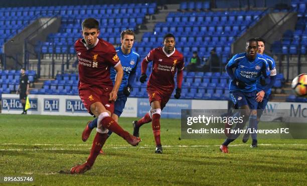 Cameron Brannagan of Liverpool takes a penalty during the Liverpool v PSV Eindhoven Premier League International Cup game at Prenton Park on December...