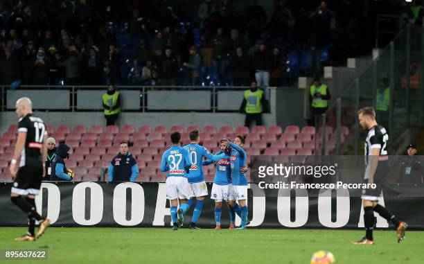 Players of SSC Napoli Dries Mertens celebrate after the 1-0 goal scored by Lorenzo Insigne, beside the disappointment of Emil Hallfredsson and Silvan...