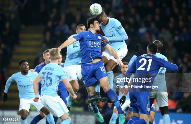 Harry Maguire of Leicester City in action with Eliaquim Mangala of Manchester City during the Carabao Cup Quarter-Final match between Leicester City...