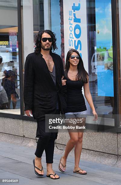 Russell Brand and fan on location for "Get Him To The Greek" in Rockefeller Center on August 1, 2009 in New York, New York.