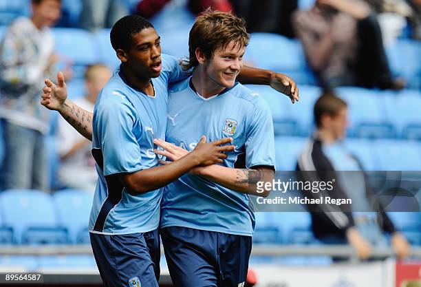 Aron Gunnarsson of Coventry celebrates his late equaliser with team mate Shaun Jeffers during the pre season friendly match between Coventry City and...