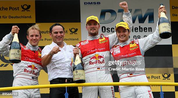 Mattias Ekstroem of Sweden and Red Bull Audi A4 finishing 2nd position, Hans Juergen Abt , team manger of Audi, Timo Scheider of Germany and Audi A4...