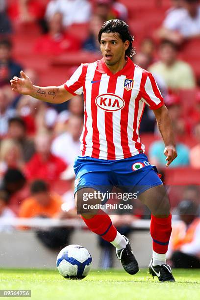 Sergio Kun Aguero of Athletico controls the ball during the Emirates Cup match between Athletico Madrid and Paris Saint-Germain at the Emirates...