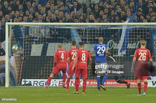 Max Meyer of Schalke scores the team`s first goal during the Bundesliga match between FC Schalke 04 and 1. FC Koeln at Veltins-Arena on December 19,...