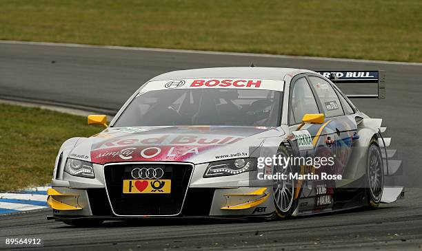 Martin Tomczyk of Germany and Red Bull Cola Audi A4 in action during the DTM 2009 German Touring Car Championship at the Motorsport Arena on August...