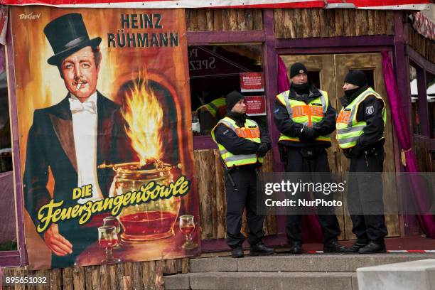 Policemen patrol the area before a commemoration of 2016 Christmas Market Attack at Breitscheidplatz in Berlin, Germany on December 19, 2017.