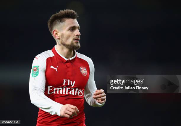 Mathieu Debuchy of Arsenal looks on during the Carabao Cup Quarter Finals match between Arsenal and West Ham United at Emirates Stadium on December...
