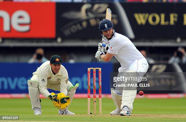 England batsman Andrew Flintoff hits the ball in front of Australian wicket keeper Graham Manou on the fourth day of the third Ashes cricket test...