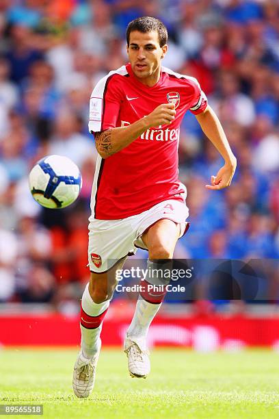 Cesc Fabregas of Arsenal runs with the ball during the Emirates Cup match between Arsenal and Glasgow Rangers at the Emirates Stadium on August 2,...