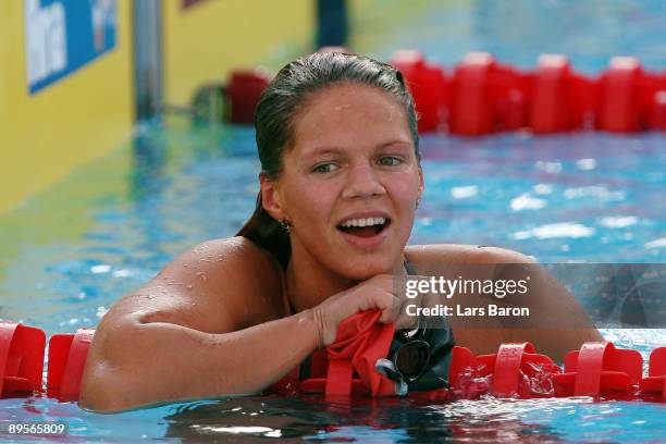 Yuliya Efimova of Russia celebrates after breaking the world record setting a new time of 30.09 seconds in the Women's 50m Breaststroke Final during...