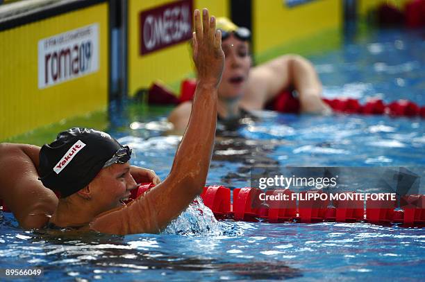 Russia's Yuliya Efimova celebrates after the women's 50m breaststoke final on August 2, 2009 at the FINA World Swimming Championships in Rome....