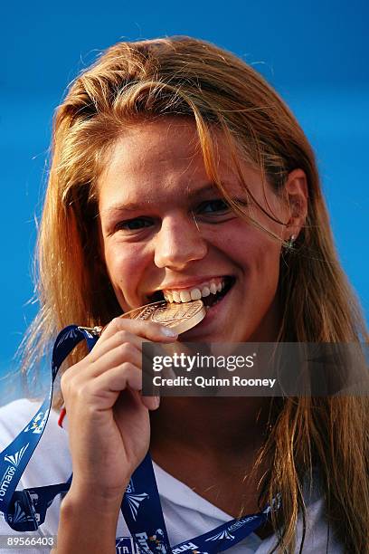 Yuliya Efimova of Russia receives the gold medal during the medal ceremony for the Women's 50m Breaststroke Final during the 13th FINA World...