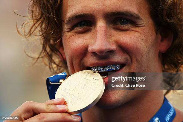 Ryan Lochte of the United States receives the gold medal during the medal ceremony for the Men's 400m Individual Medley Final during the 13th FINA...