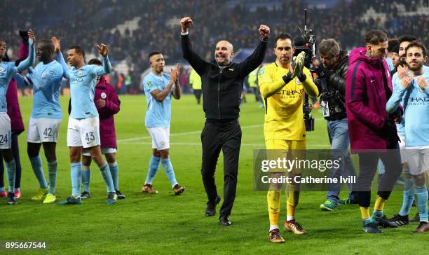 Claudio Bravo of Manchester City and Josep Guardiola, Manager of Manchester City celebrate penalty shoot out victory after the Carabao Cup...