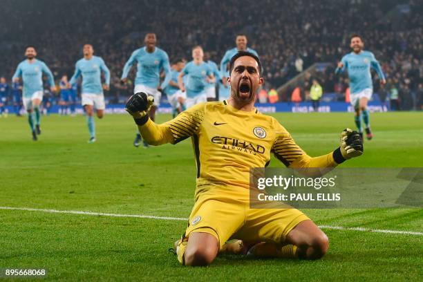 Manchester City's Chilean goalkeeper Claudio Bravo celebrates after saving the final Leicester penalty to win the penalty shoot out after extra time...