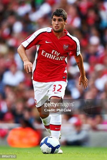 Fran Merida of Arsenal runs with the ball during the Emirates Cup match between Arsenal and Glasgow Rangers at the Emirates Stadium on August 2, 2009...