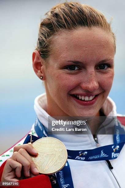 Katinka Hosszu of Hungary receives the gold medal during the medal ceremony for the Women's 400m Individual Medley Final during the 13th FINA World...