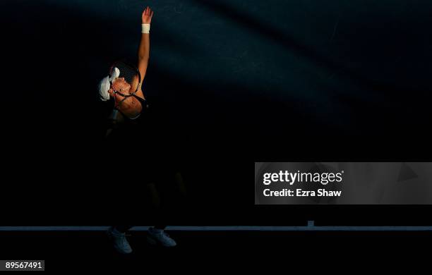 Samantha Stosur of Australia serves to Marian Bartoli of France during their semifinal match on Day 6 of the Bank of the West Classic August 1, 2009...