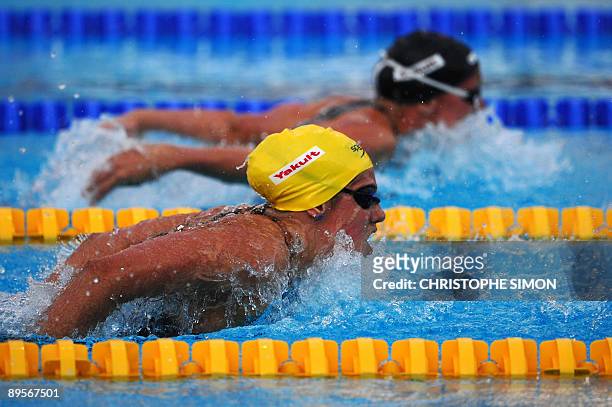 Hungary's Katinka Hosszu and Australia Stephanie Rice compete during the women's 400m individual medley final on August 2, 2009 at the FINA World...