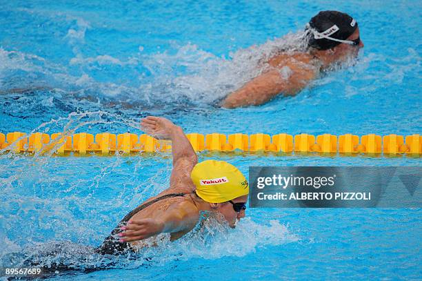 Hungary's Katinka Hosszu and Australia Stephanie Rice compete during the women's 400m individual medley final on August 2, 2009 at the FINA World...