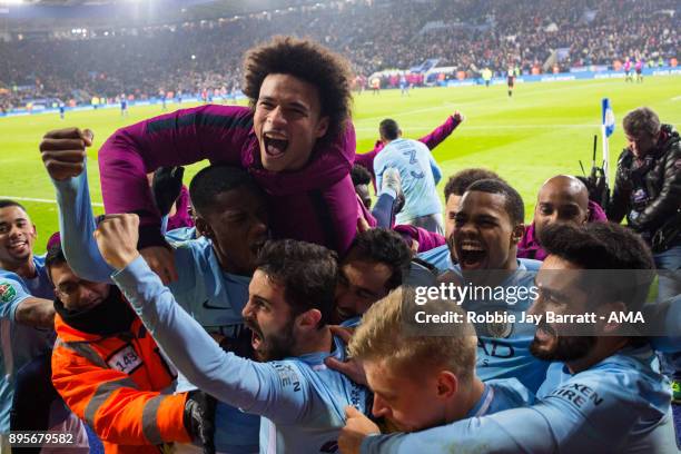 Manchester City players celebrate at full time during the Carabao Cup Quarter-Final match between here Leicester City v Manchester City at The King...