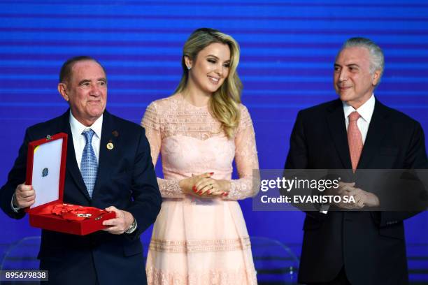 Brazilian President Michel Temer and First Lady Marcela Temer decorate Brazilian comedian and UNICEF ambassador Renato Aragao, during the Order of...