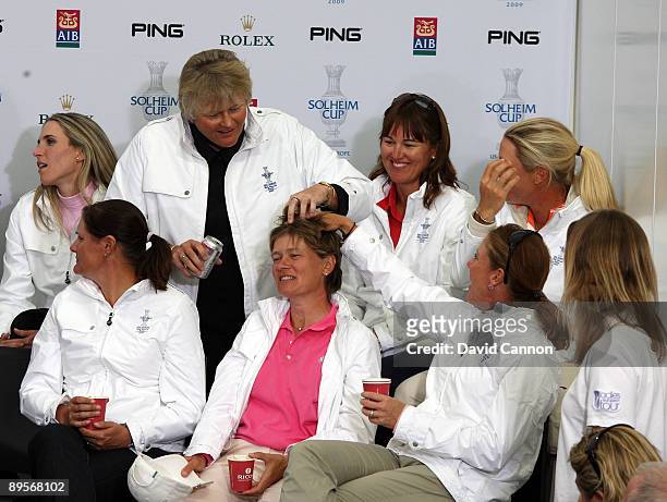 European players led by Laura Davies of England joke with Catriona Matthew of Scotland at a Press Conference to announce the teams for the 2009...