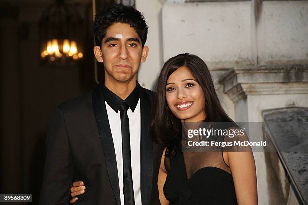 Dev Patel and Freida Pinto attend a photo opportunity before introducing a showing of Slumdog Millionaire at the Film4 Summer Screen at Somerset...