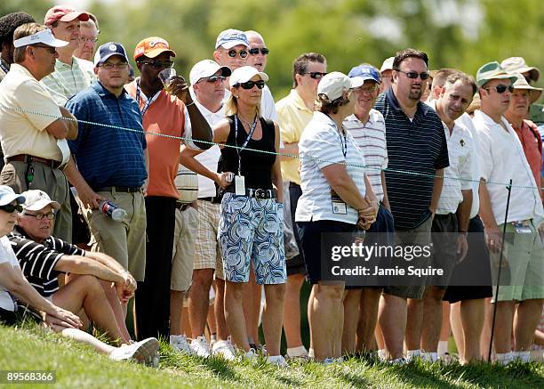 Chris Evert looks on as husband Greg Norman of Australia plays the 5th hole during the final round of the 2009 U.S. Senior Open on August 2, 2009 at...