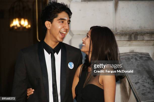 Dev Patel and Freida Pinto attend a photo opportunity before introducing a showing of Slumdog Millionaire at the Film4 Summer Screen at Somerset...