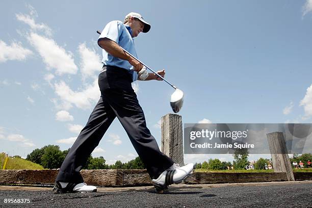 Fred Funk of the USA walks across a bridge to the teebox on the 4th hole during the final round of the 2009 U.S. Senior Open on August 2, 2009 at...