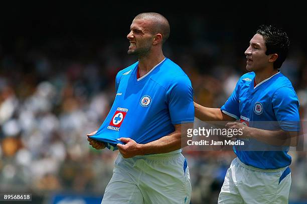 Emanuel Villa of Cruz Azul celebrates after scoring against Pumas in a 2009 Apertura soccer match at the Olimpico Stadium on August 2, 2009 in Mexico...