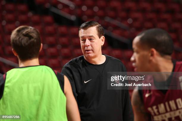Associate head coach Stan Jones of the Florida State Seminoles directs the players as they warm up prior to the game against the Oklahoma State...