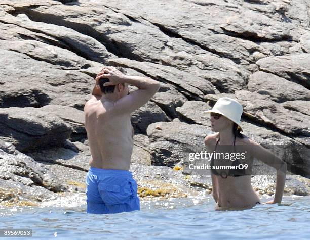 French President Nicolas Sarkozy and his wife Carla Bruni-Sarkozy vacation at le Cap Negre on August 1, 2009 in Saint-Tropez, France.