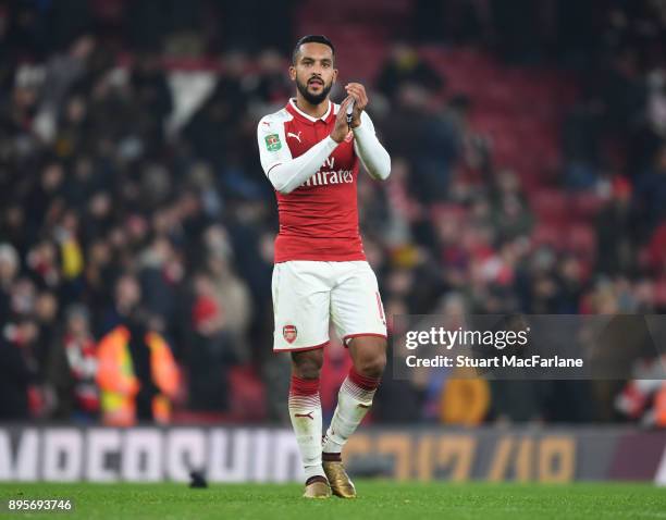 Theo Walcott applauds the Arsenal fans after the Carabao Cup Quarter Final match between Arsenal and West Ham United at Emirates Stadium on December...