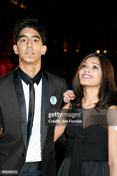 Dev Patel and Freida Pinto attend a screening of 'Slumdog Millionaire' at Somerset House on August 2, 2009 in London, England.