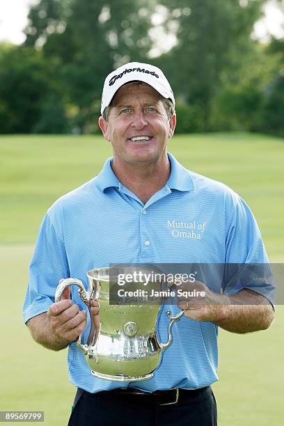 Fred Funk of the USA displays the trophy after winning the 2009 U.S. Senior Open on August 2, 2009 at Crooked Stick Golf Club in Carmel, Indiana.