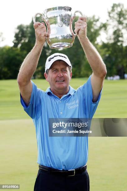 Fred Funk of the USA displays the trophy after winning the 2009 U.S. Senior Open on August 2, 2009 at Crooked Stick Golf Club in Carmel, Indiana.