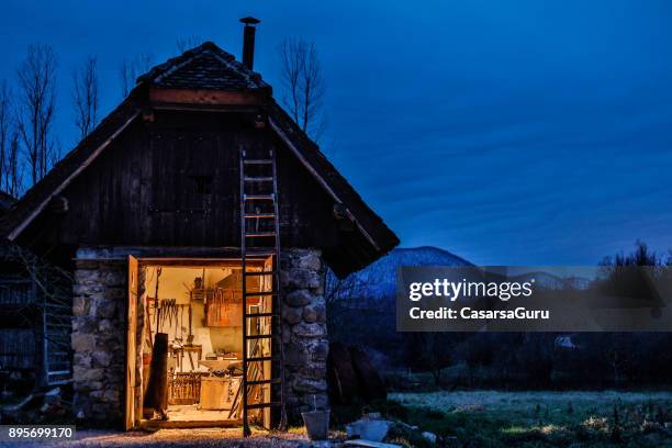 small forge on a country side at twilight - garden shed stock pictures, royalty-free photos & images