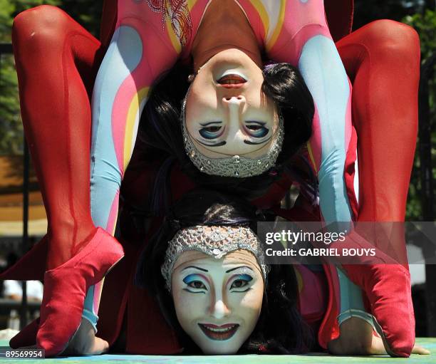 Artists perform at the Grove in Los Angeles on August 2, 2009 to celebrate the 25th anniversary of the Cirque du Soleil. The Cirque du Soleil is a...