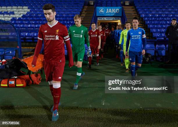 Captains Corey Whelan of Liverpool and Dirk Abels of PSV Eindhoven lead their teams to the pitch before the Liverpool v PSV Eindhoven Premier League...
